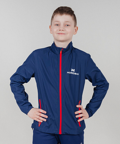картинка Куртка ветрозащитная Nordski Jr. Motion Navy/Red от магазина Одежда+